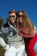 Image showing Young Couple In Winter  Snow Scene