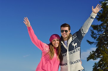 Image showing Young Couple In Winter  Snow Scene