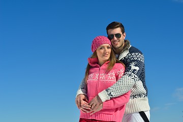 Image showing Young Couple In Winter  Snow Scene