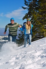 Image showing Young Couple In Winter  Snow Scene