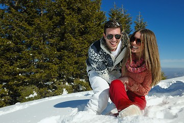 Image showing Young Couple In Winter  Snow Scene