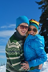 Image showing Young Couple In Winter  Snow Scene