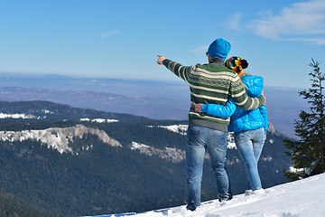 Image showing Young Couple In Winter  Snow Scene