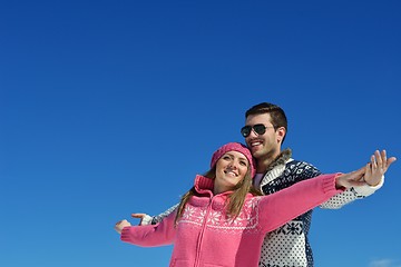 Image showing Young Couple In Winter  Snow Scene