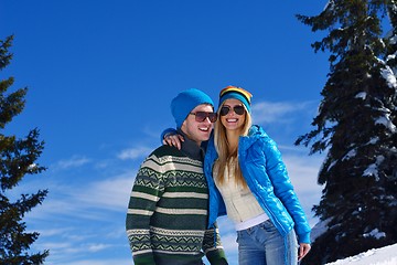 Image showing Young Couple In Winter  Snow Scene