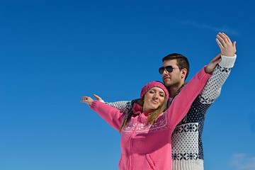 Image showing Young Couple In Winter  Snow Scene