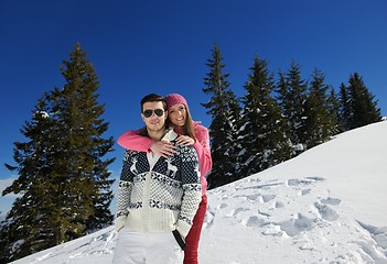 Image showing Young Couple In Winter  Snow Scene