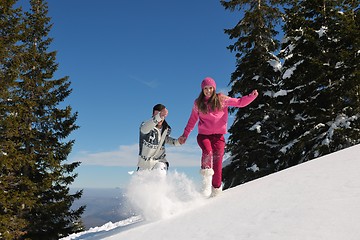 Image showing Young Couple In Winter  Snow Scene