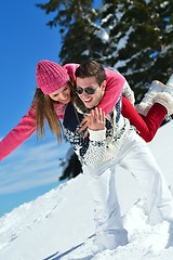 Image showing Young Couple In Winter  Snow Scene