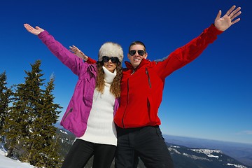 Image showing Young Couple In Winter  Snow Scene