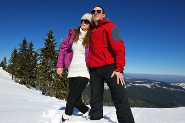 Image showing Young Couple In Winter  Snow Scene