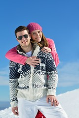 Image showing Young Couple In Winter  Snow Scene