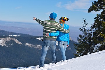 Image showing Young Couple In Winter  Snow Scene