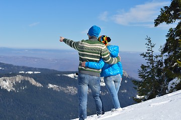 Image showing Young Couple In Winter  Snow Scene