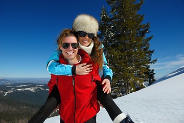 Image showing Young Couple In Winter  Snow Scene