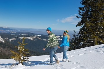 Image showing Young Couple In Winter  Snow Scene