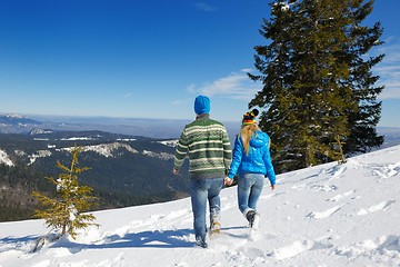 Image showing Young Couple In Winter  Snow Scene