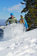 Image showing Young Couple In Winter  Snow Scene