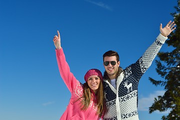 Image showing Young Couple In Winter  Snow Scene