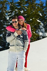 Image showing Young Couple In Winter  Snow Scene