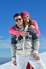 Image showing Young Couple In Winter  Snow Scene