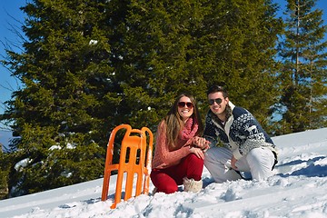 Image showing Young Couple In Winter  Snow Scene