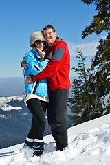 Image showing Young Couple In Winter  Snow Scene