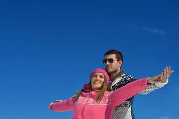 Image showing Young Couple In Winter  Snow Scene