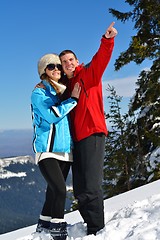 Image showing Young Couple In Winter  Snow Scene