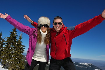 Image showing Young Couple In Winter  Snow Scene