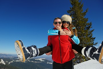 Image showing Young Couple In Winter  Snow Scene