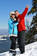 Image showing Young Couple In Winter  Snow Scene