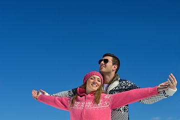 Image showing Young Couple In Winter  Snow Scene