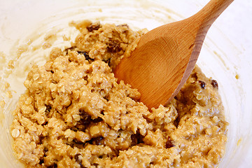 Image showing Mixing oatmeal raisin cookie dough