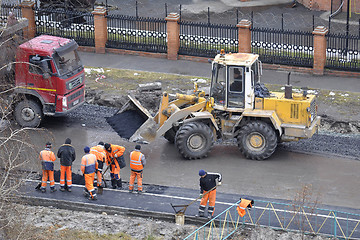 Image showing Special equipment on repair of roads. bulldozer.