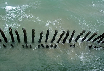 Image showing wooden poles