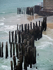 Image showing wooden poles