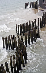 Image showing wooden poles