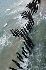 Image showing wooden poles