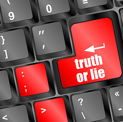 Image showing truth or lie button on computer keyboard key