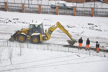 Image showing Special equipment on road construction. Snowfall