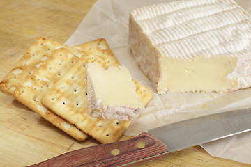 Image showing Pont l'eveque cheese and biscuites