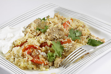 Image showing Chicken biriyani with yoghurt