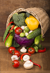 Image showing Healthy Organic Vegetables on a Wooden Background