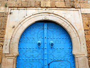 Image showing Blue gate in the stone wall