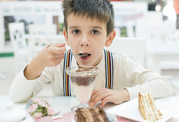 Image showing Child eat milk choco shake