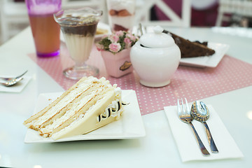 Image showing White Cake and a milkshake in confectionery