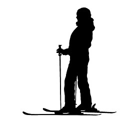 Image showing Mountain skier  speeding down slope. Vector sport silhouette.