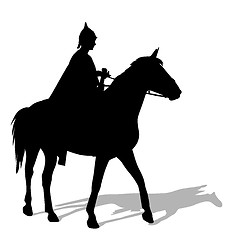 Image showing Rider on a horse in clothing warrior with a sword and wearing a 