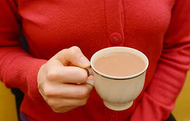 Image showing Cup of tea in a woman's hand
